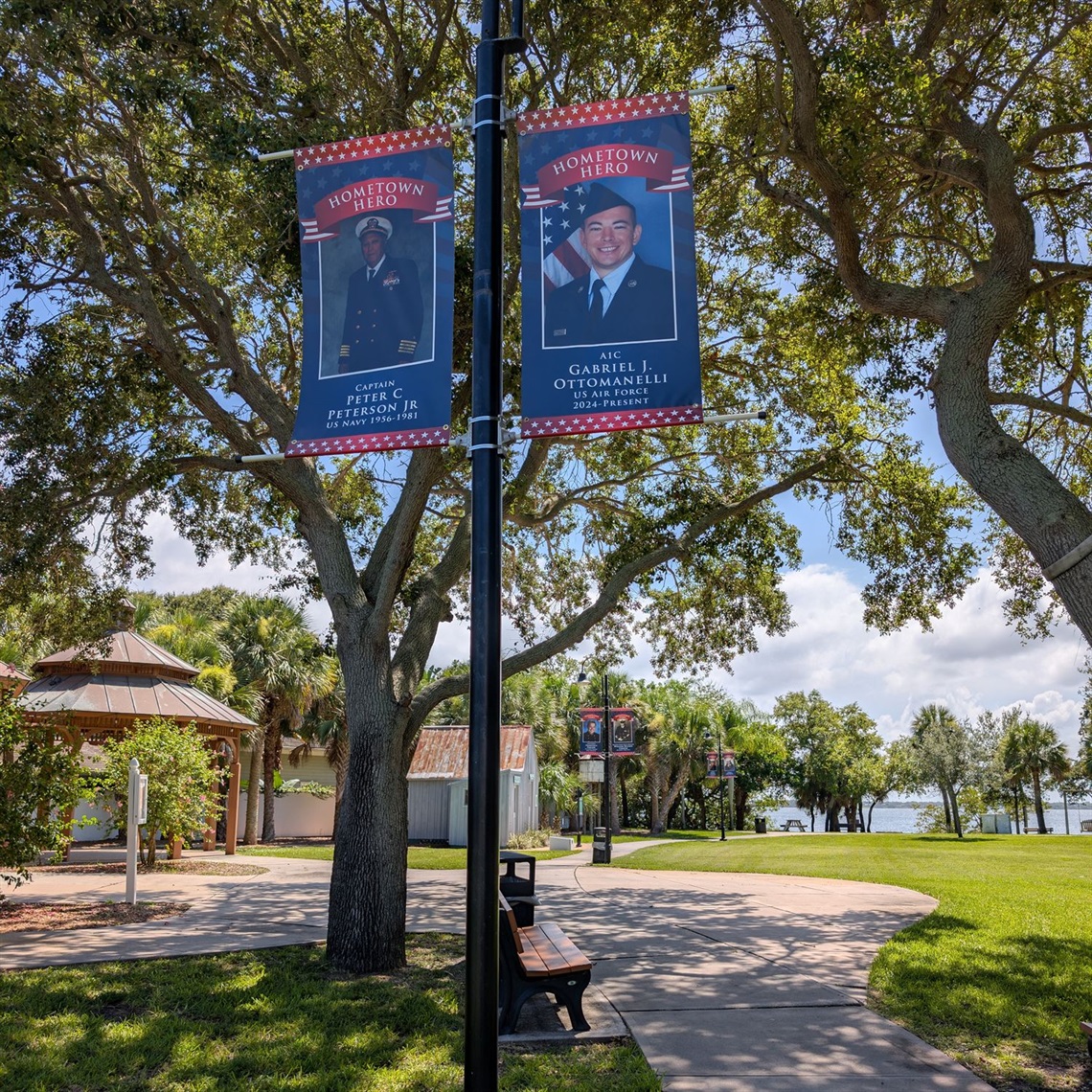 Photo of banners hanging from light poles in Ryckman Park